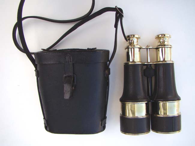 A very nice pair of large Antique Binoculars with their original leather case circa 1890